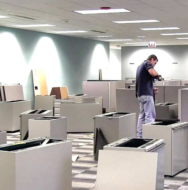 Silicon Valley Movers work on an Office Decommissioning disassemble cubes San Jose Mover Moves Adds Changes crew