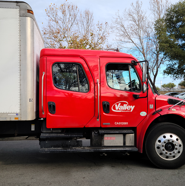 Valley Relocation San Francisco Mover red truck