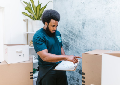 A technology mover is working with some boxes for specialized transportation logistics