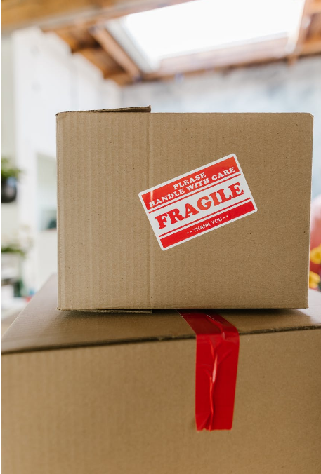 Specialized moving services moving a fragile package