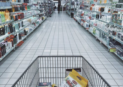 A trolley with groceries in a retail outlet