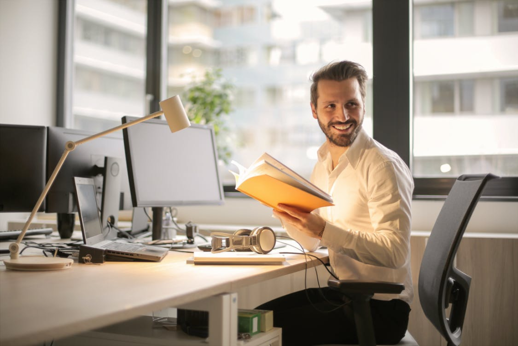 Happy employee working in an office