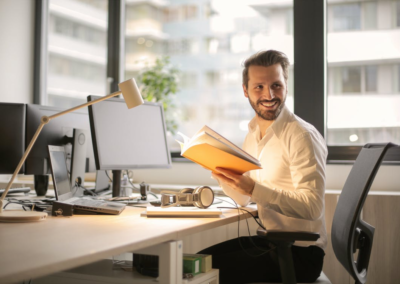 Happy employee working in an office