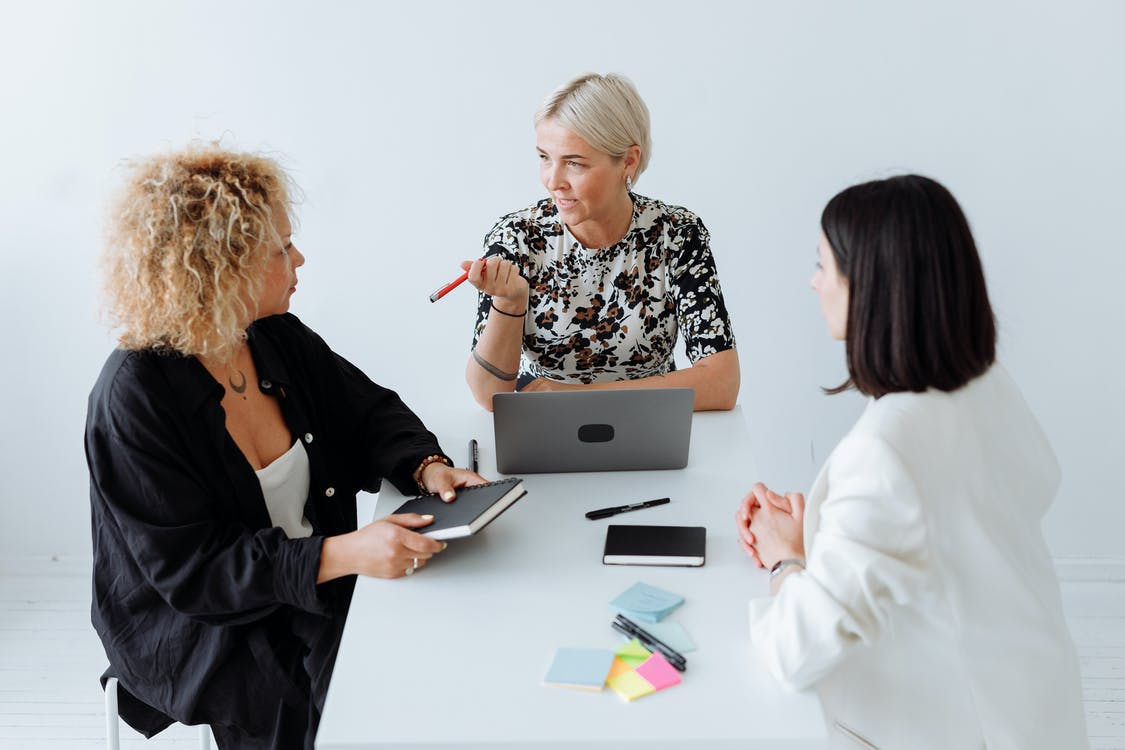 Three women in a meeting