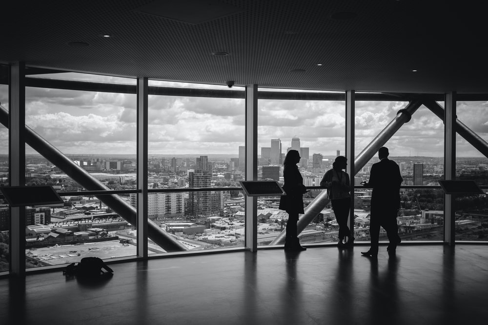 Three people discussing IT data relocations