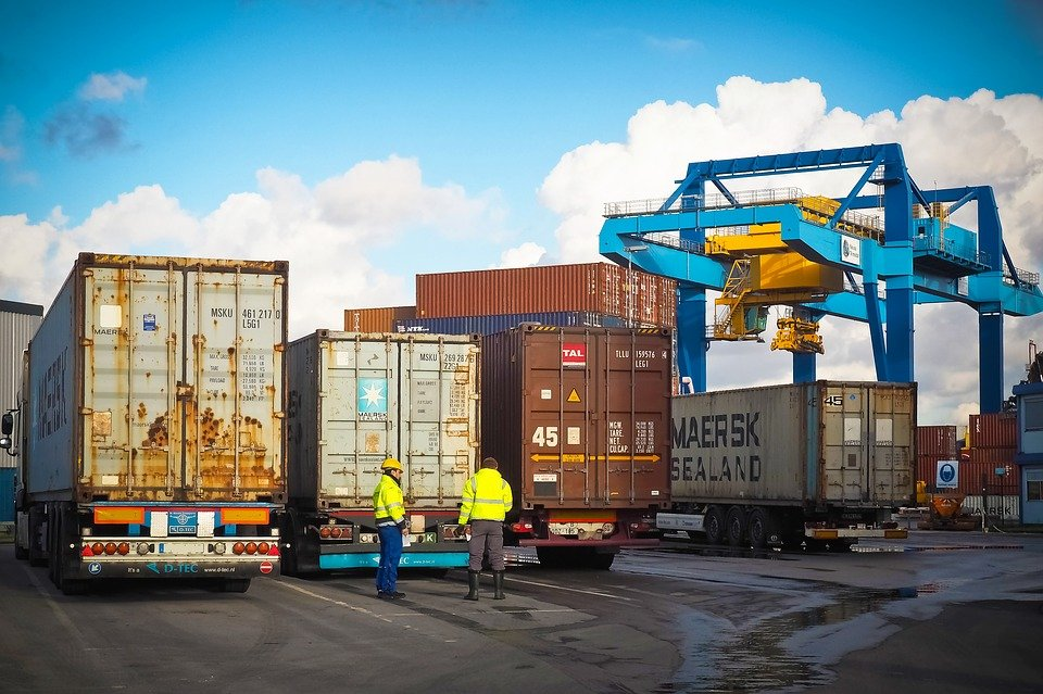 Heavy equipment loaded in containers