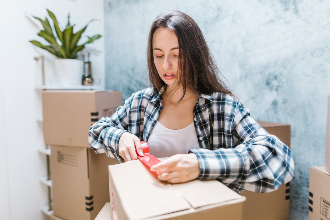 Using tape to secure boxes