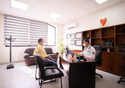 A patient consulting with a doctor in his office