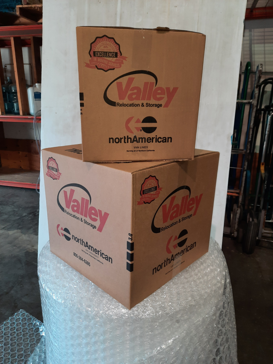  A stack of Valley Relocation boxes.