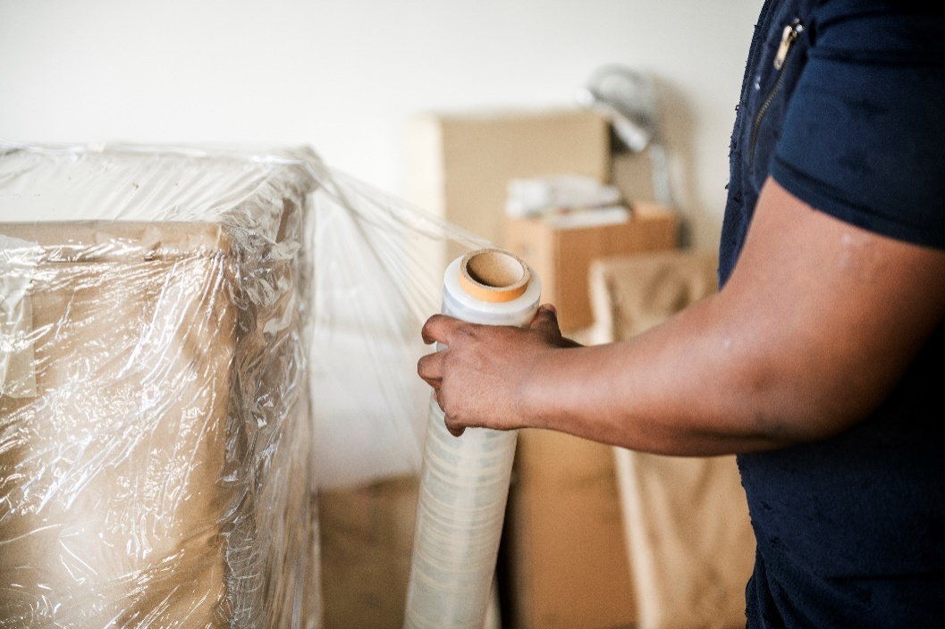 Box being covered with wrap