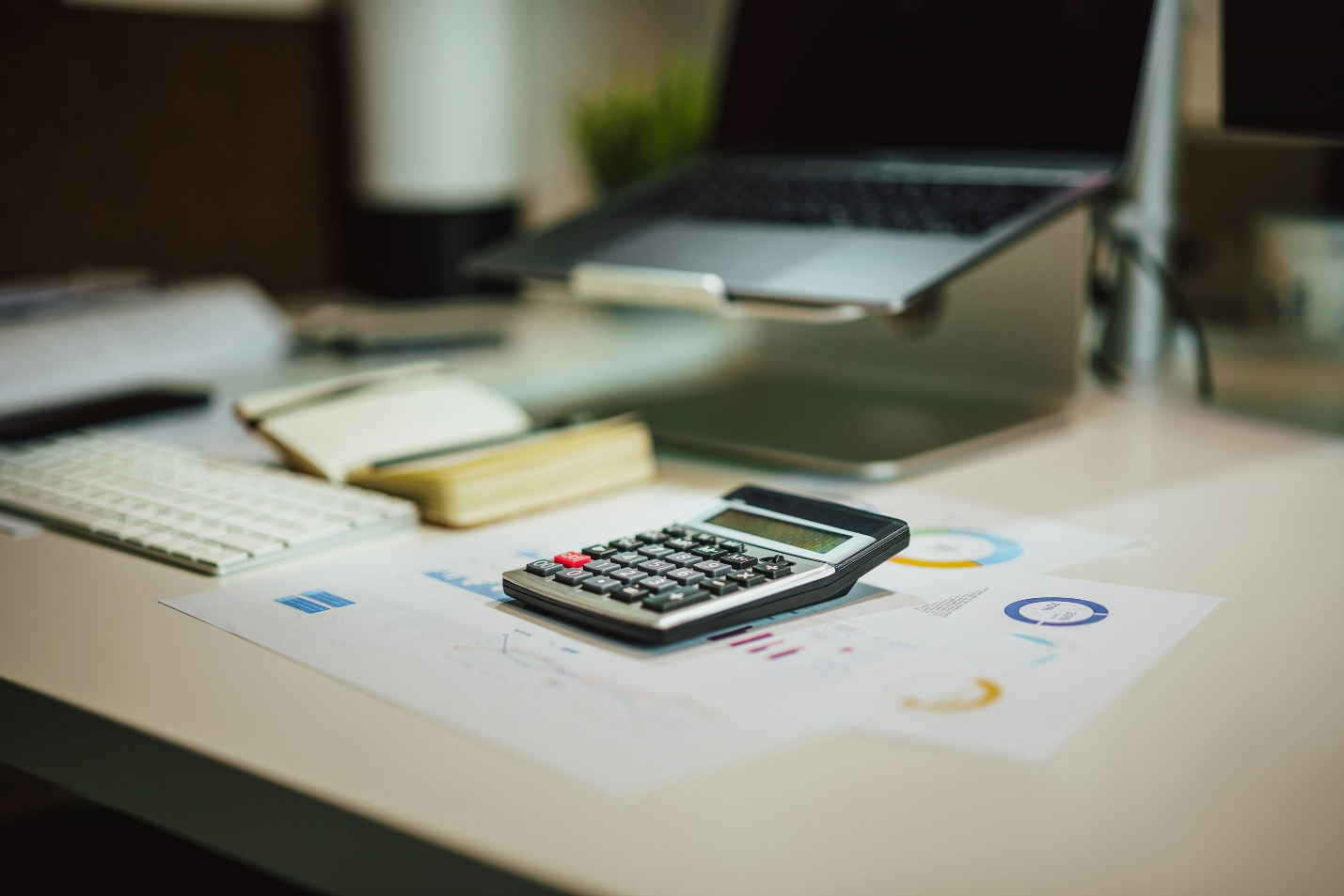 A table full of graphs and calculators. 