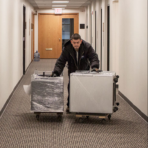 A person moving items.