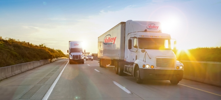 Moving trucks on the road