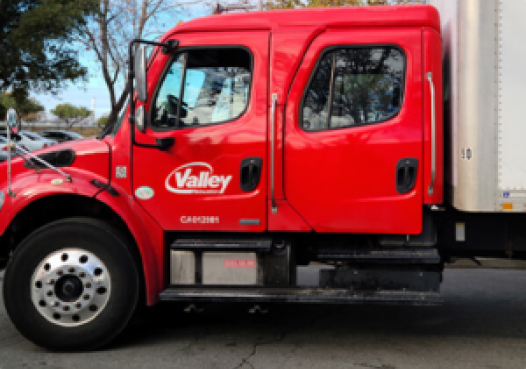 A red and white moving truck.