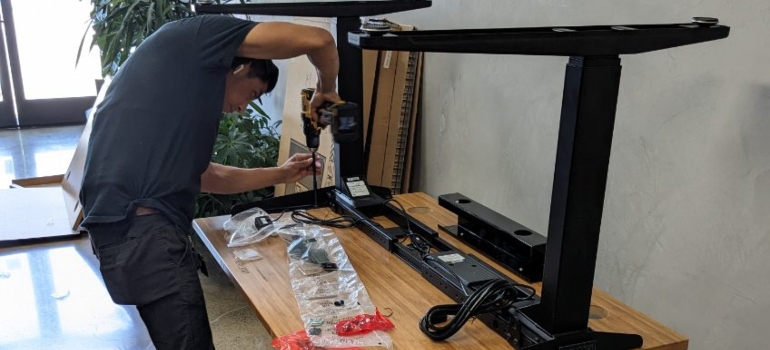 Bay Area packing services preparing some desks for relocation.