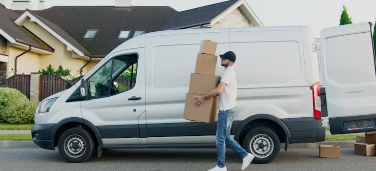 Mover unloading boxes out of a truck.