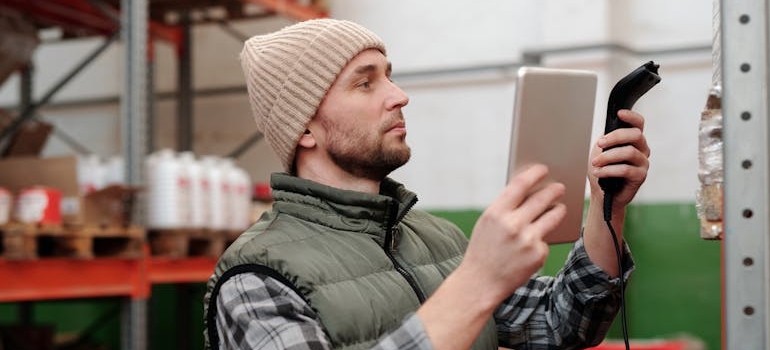 Man checking the inventory.