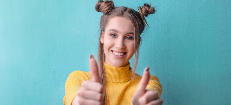 Woman showing thumbs up 