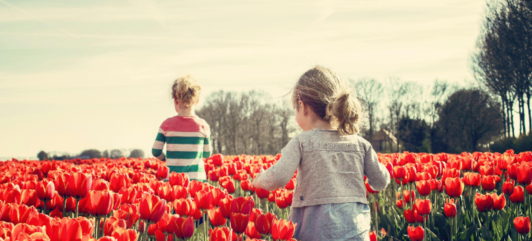 kids playing with flowers 