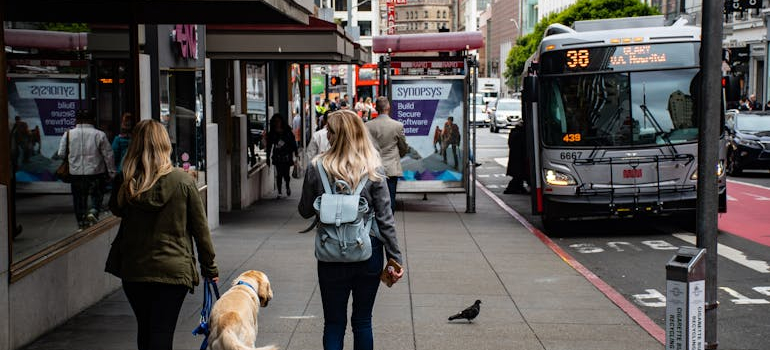 people walking on the sidewalk