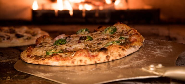 Baked Pizza on Pizza Peel in Oven