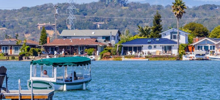 Boat on Lake near Houses