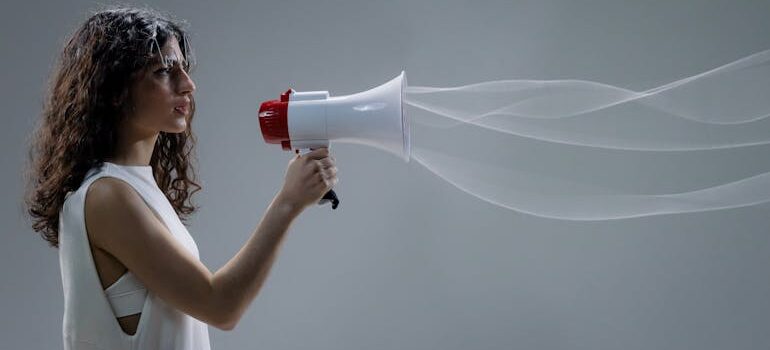 a woman talking about The environmental impact of business relocation