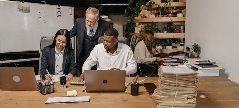 Four People Working in the Office