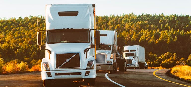 White Volvo Semi-truck on Side of Road